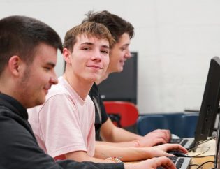 Our Impact Kids on Computer